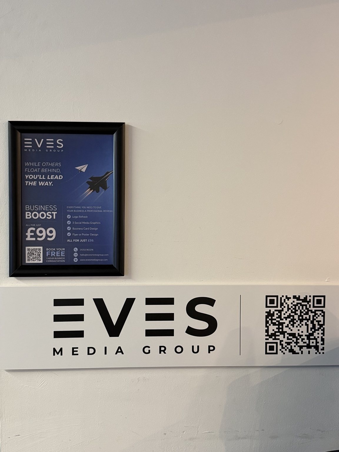 Campaign artwork displayed at a local venue